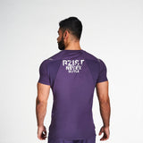 Never Settle Men's Purple Performance T-Shirt